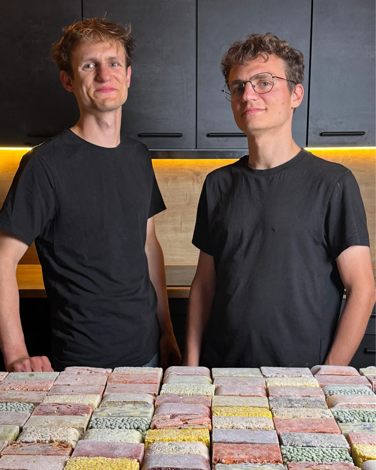 Jo and Bart in their kitchen with frozen meal blocks