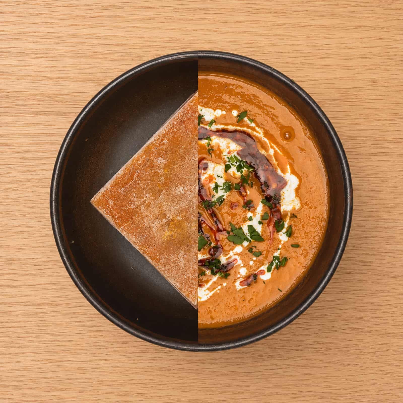 Bowl of butternut squash soup, garnished